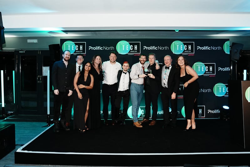 Apex Computing IT Support Team receiving an award for best company culture at Prolific Awards Ceremony in Manchester